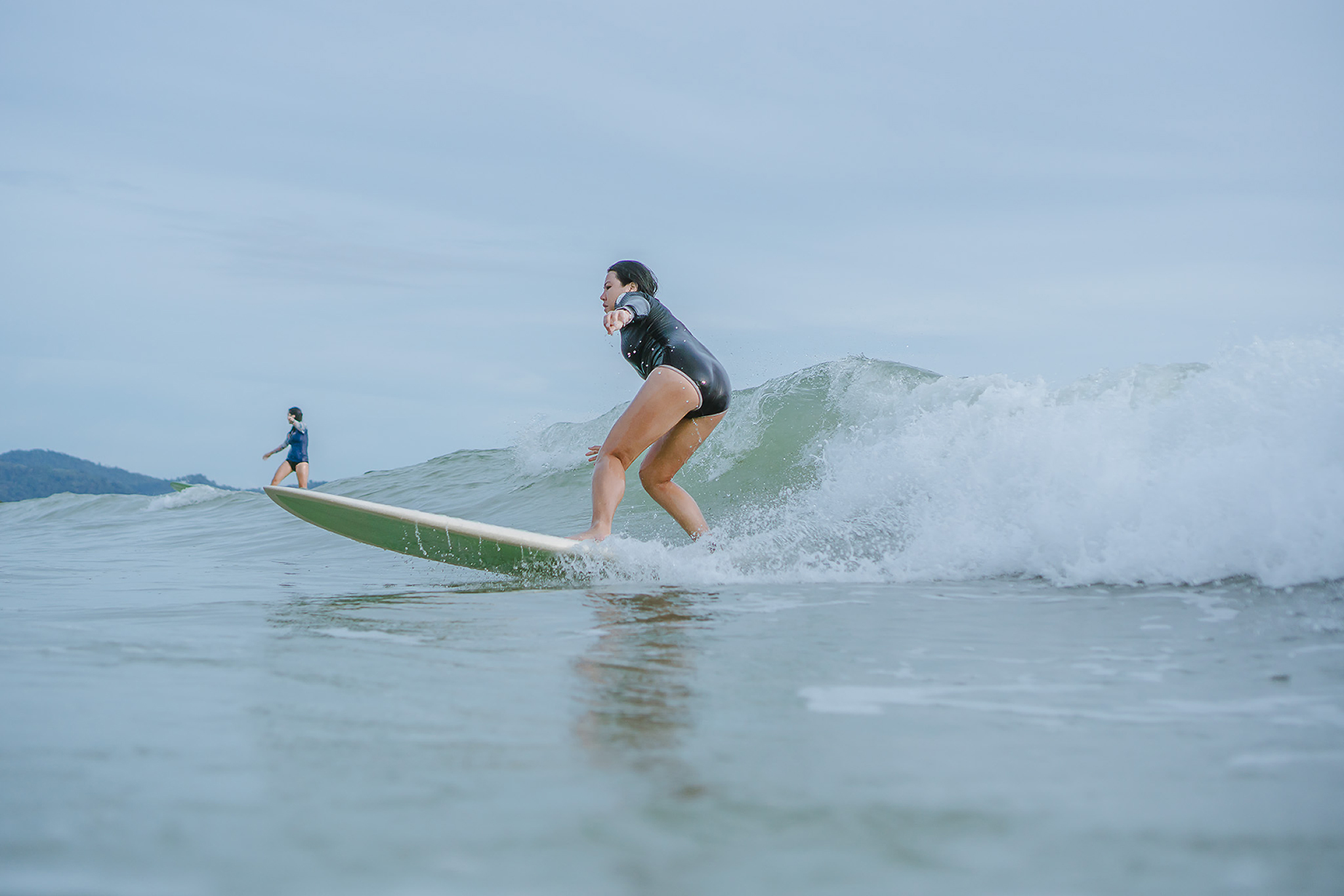 Riding the point at Coral Bay
